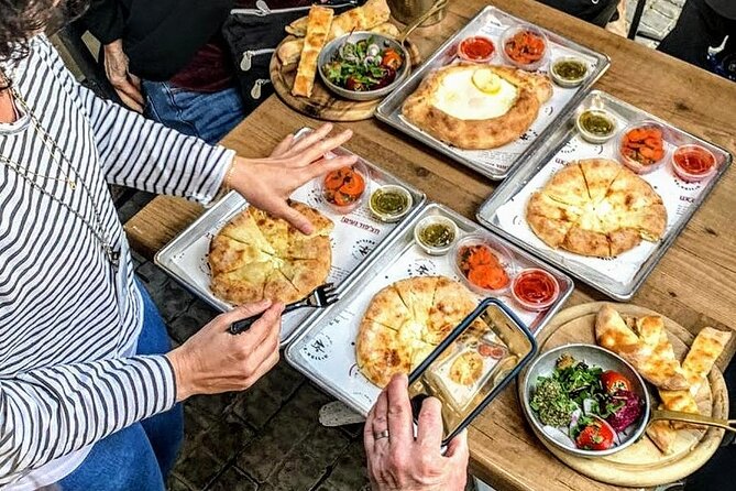 Mahane Yehuda Market food tour jerusalem - The first tastings: hummus, arak, and market basics